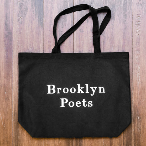 Black Brooklyn Poets tote bag featuring white print of Brooklyn Poets logo 