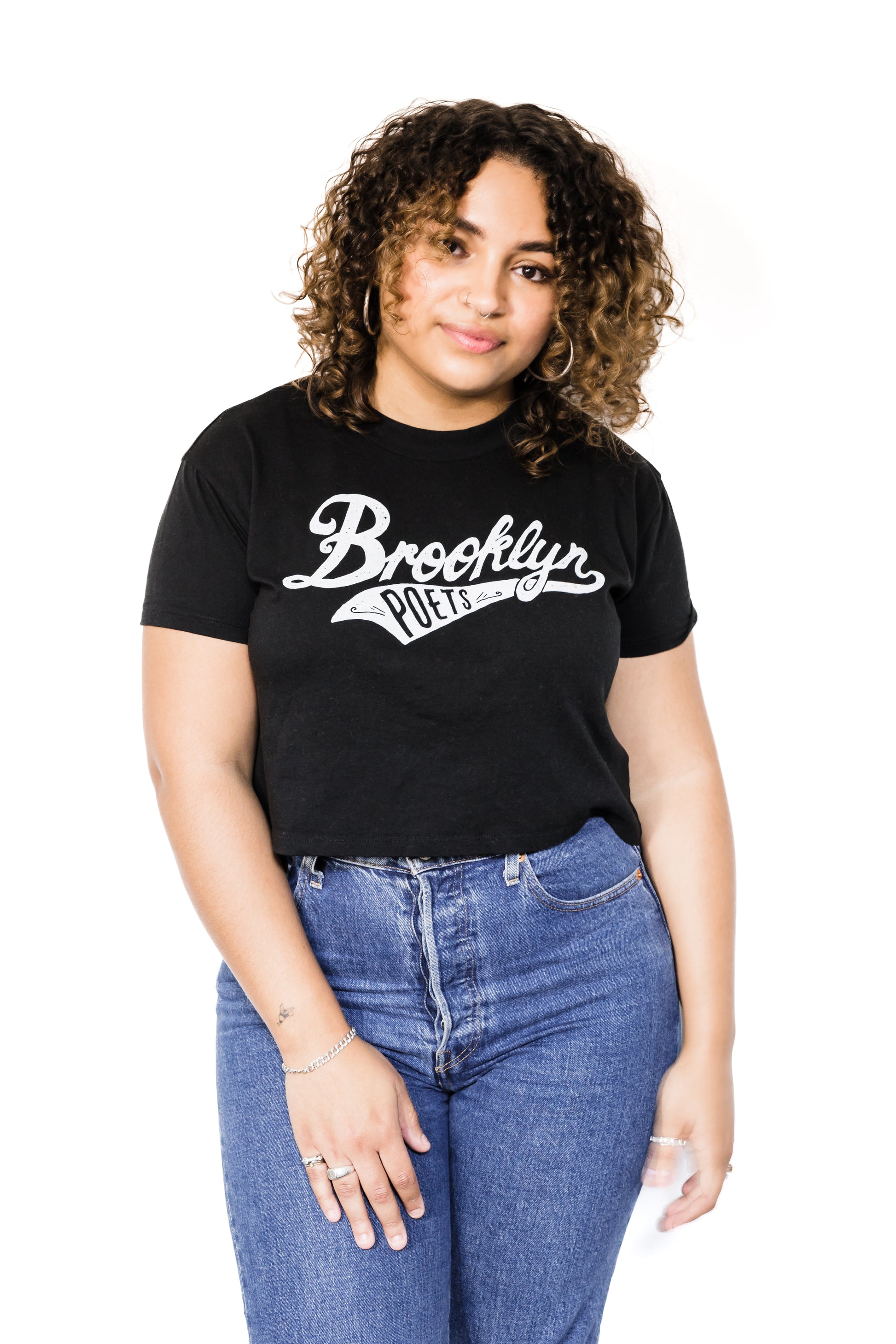 Front of Black female model wearing a Brooklyn Poets baseball tee