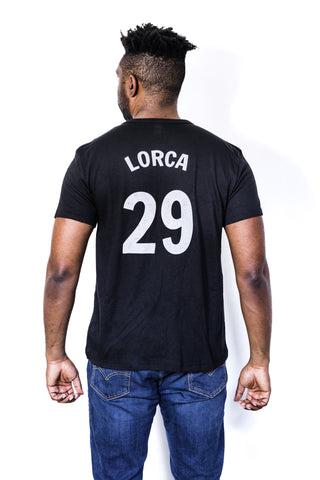 Back of Black male model wearing a Lorca #29 black unisex tee